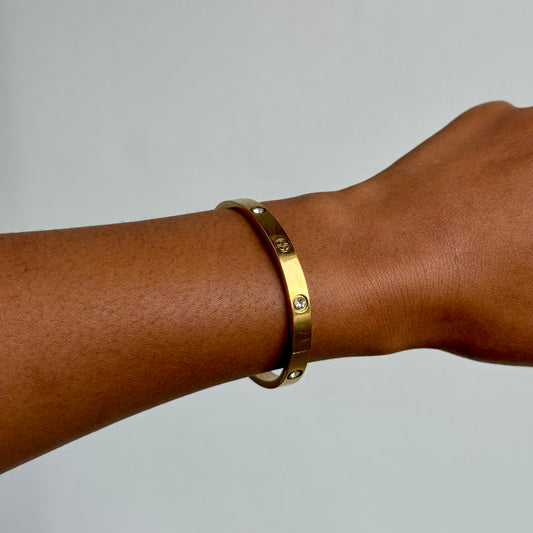 Our 18K Gold Plated Bangle with Gold Zircon Accents