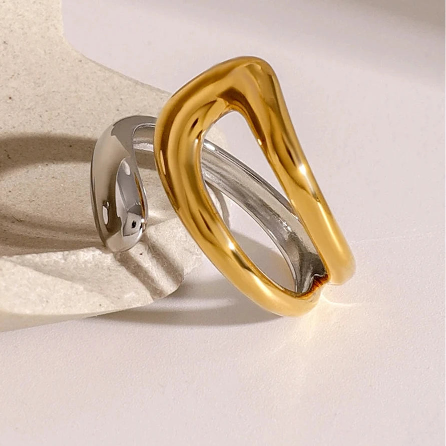 Asymmetric mixed metal ring 